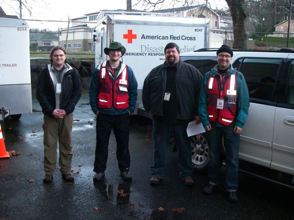 Communication Trailer Crew ready to deploy.  From left: Casey Hickerson, AE7SL; Brian Shaw, KE7CNM; Brian Drake, N7BKD; and John Carscadden, W7AFX