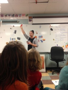 Krystina teaches students  about types of food are good for their disaster kit.