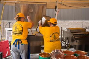 With the resources in place to coordinate a large-scale feeding operation, Red Cross partners at the Southern Baptist Convention prepare a hot lunch for delivery.